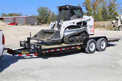 dump truck and skid steer for sale|tilt bed skid loader trailers.